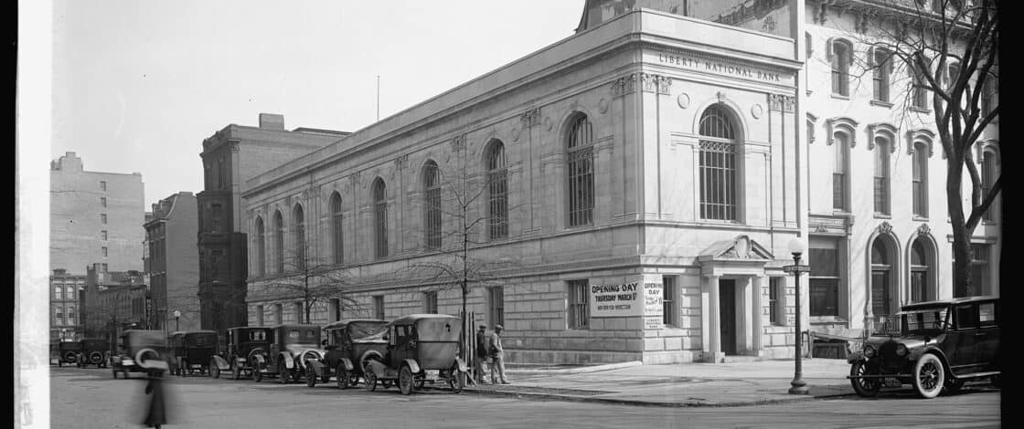 Exterior of a large early-20th-century bank building with classical columns.