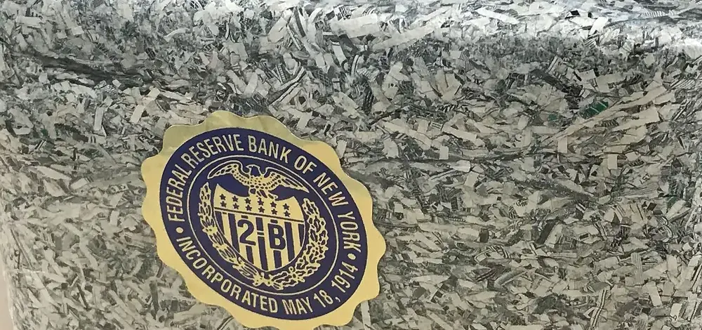 How Much Does It Cost to File Chapter 7? Every Line Item — Shredded US-Dollar Notes front view